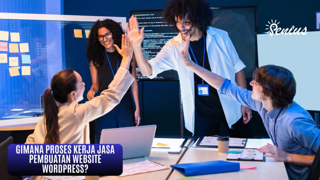 Tim sedang high five setelah diskusi proses kerja jasa pembuatan website wordpress